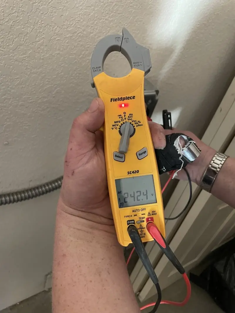 Voltage testing with clamp meter during Generator Installation in Westmont